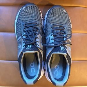 Gently used On Cloud running shoes.  Grayish green and white.  In great shape.